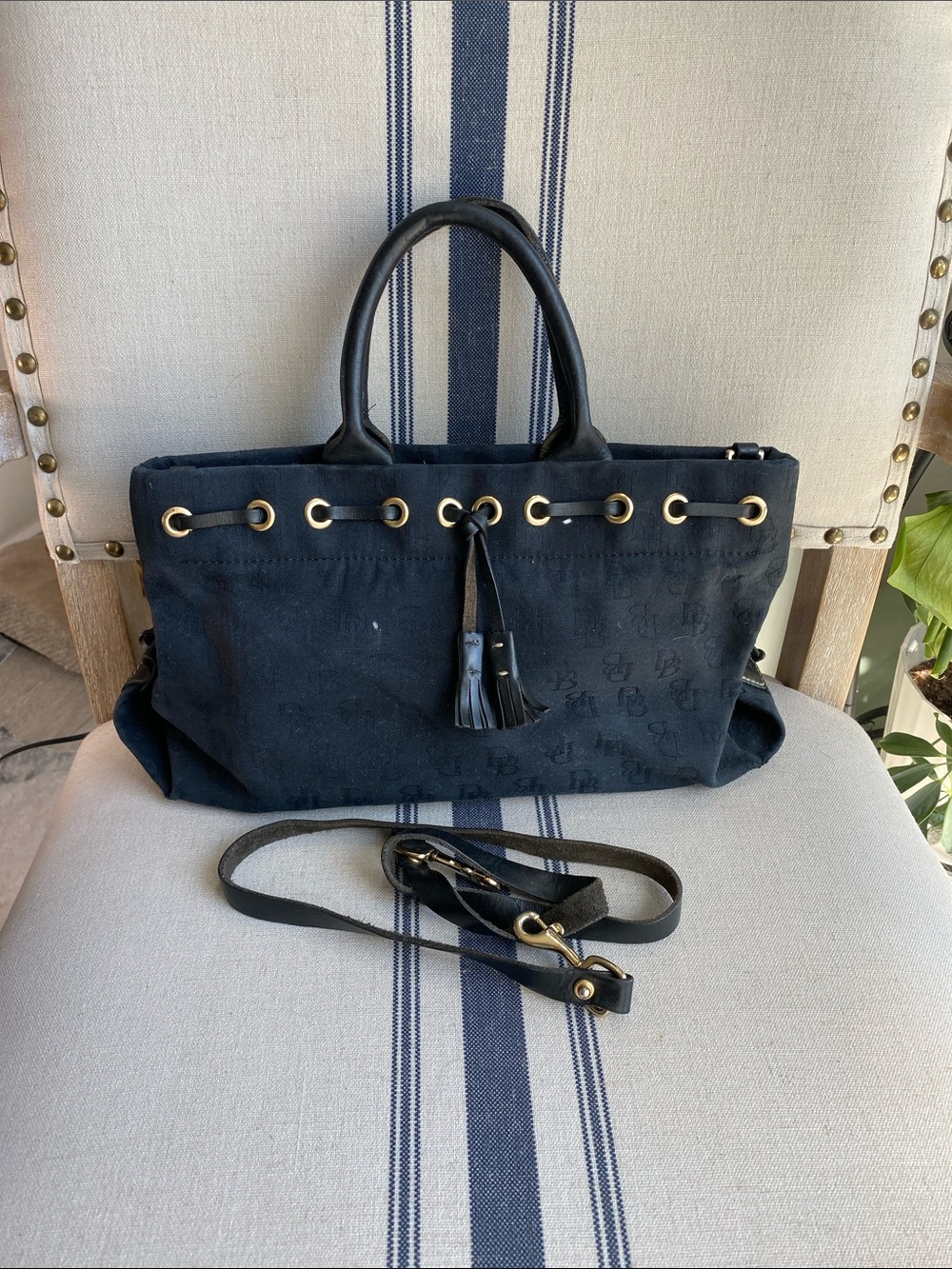 Dooney & Bourke Black Canvas Tassel Tote with Gold Grommets and shoulder strap